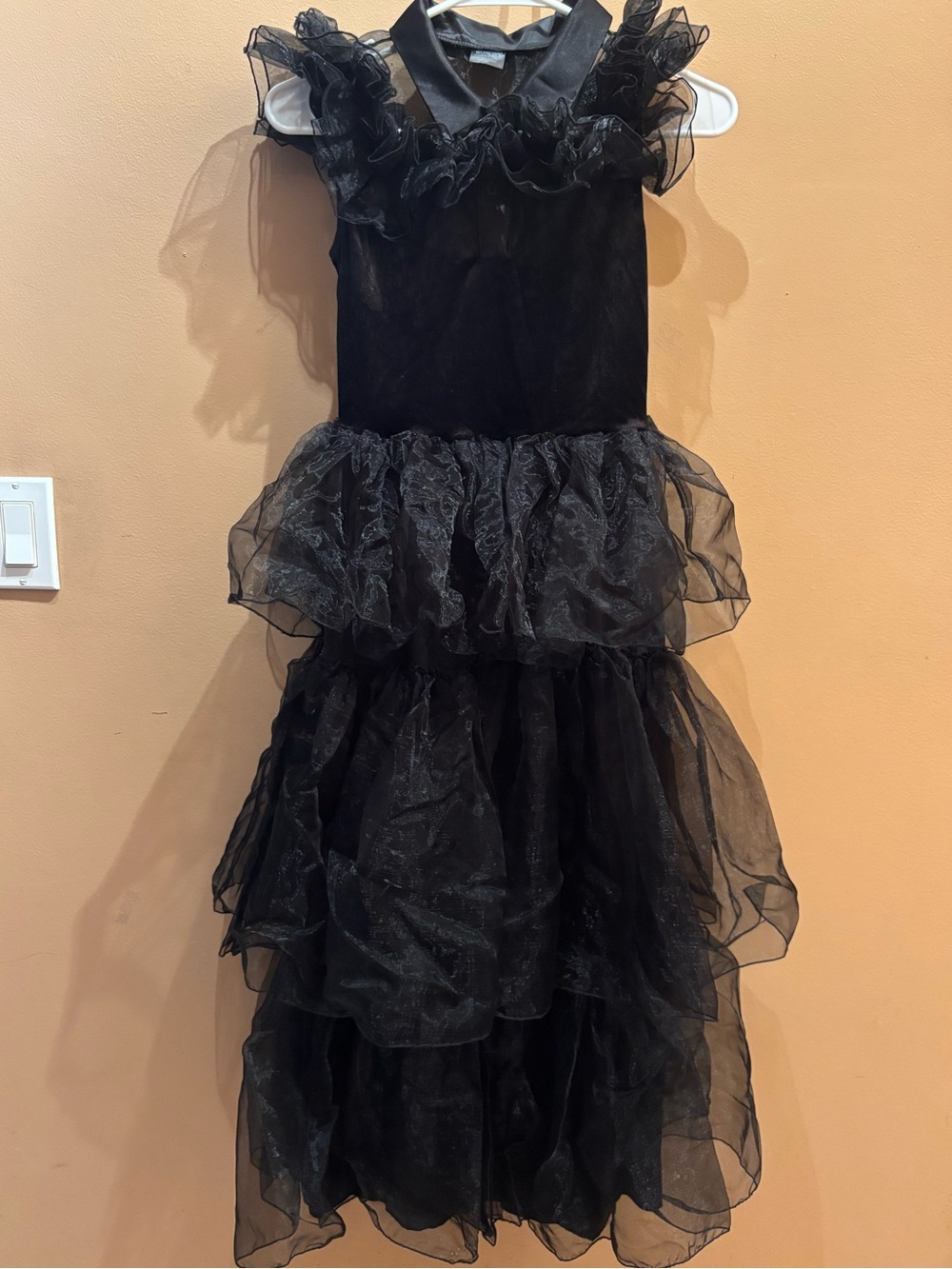 Wednesday Addams Dress features dramatic, tiered black organza ruffles Medium